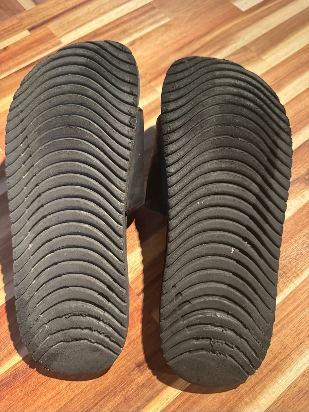Nike Black Slide Sandals with Gold Swoosh - Kids